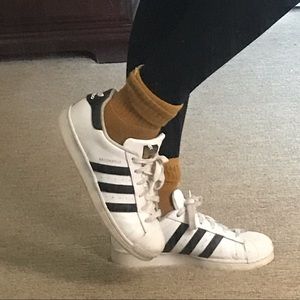 White and black adidas superstar’s